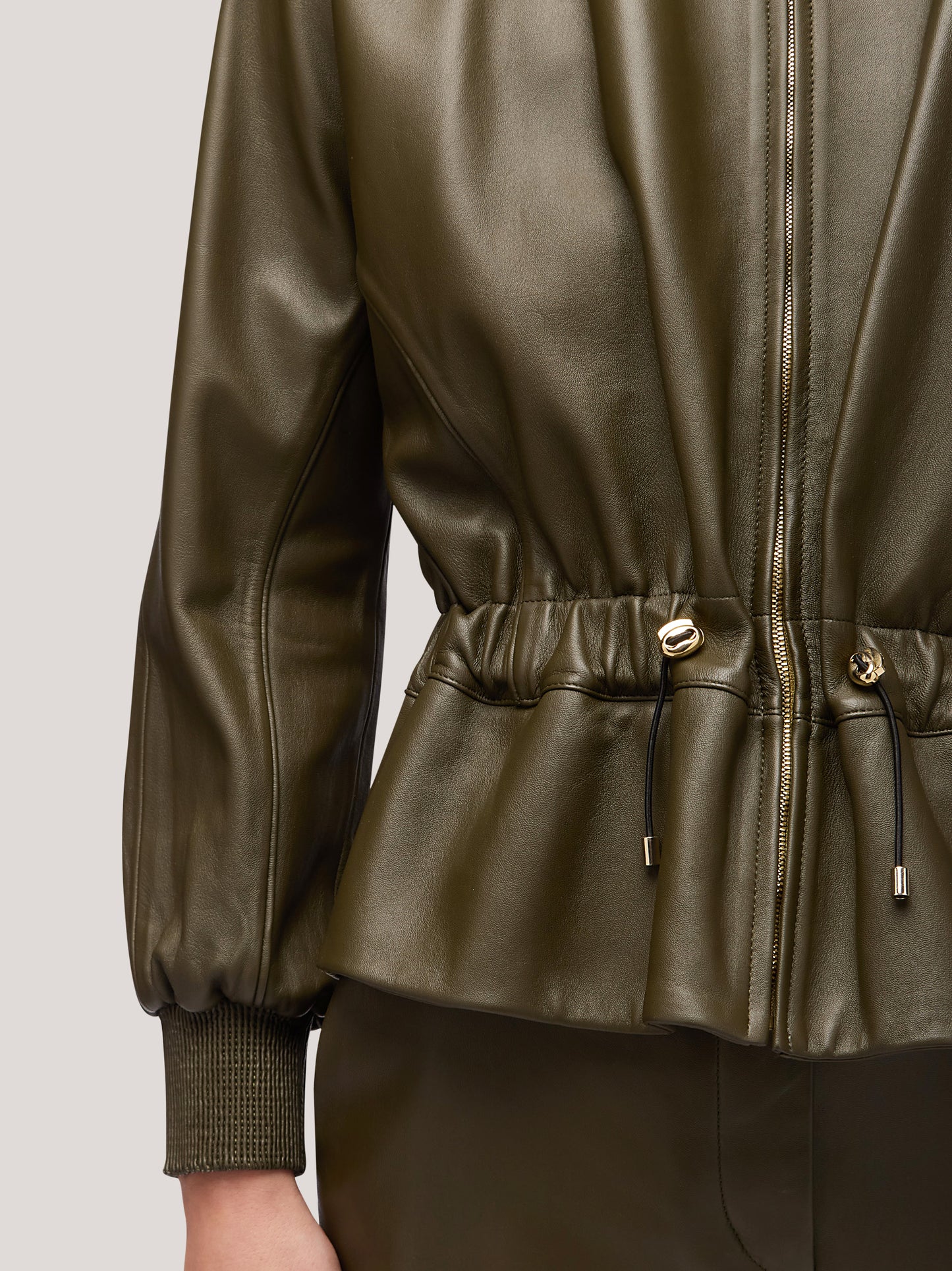 Giacca donna in pelle con coulisse in vita militare cpa073_f2515a_mi0001 68145845174598